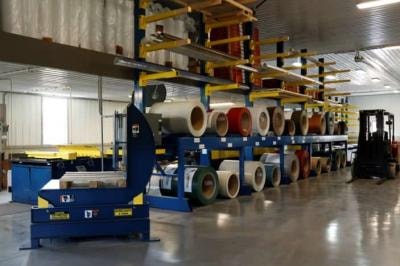 Kingdom Building Supply warehouse interior with metal coil stock