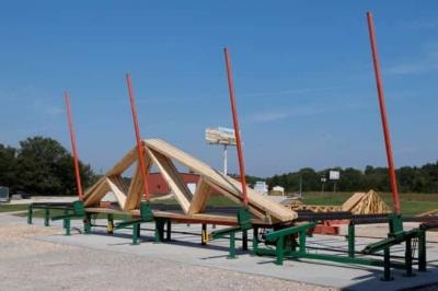 Kingdom Building Supply truss yard with engineered wooden trusses